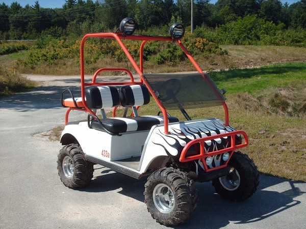 A golf car available from North Country Golf Car