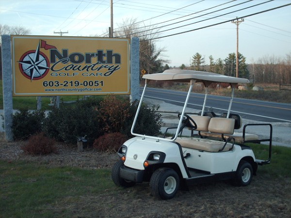 A golf car available from North Country Golf Car
